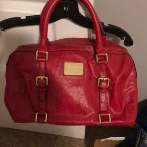 Armani change red bag with gold accents